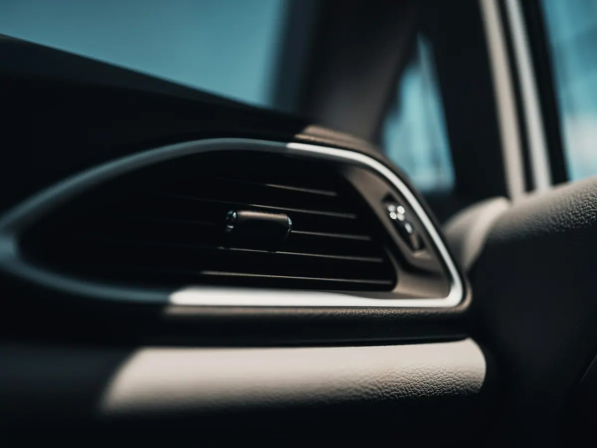 Close detail of a door handle and body surface